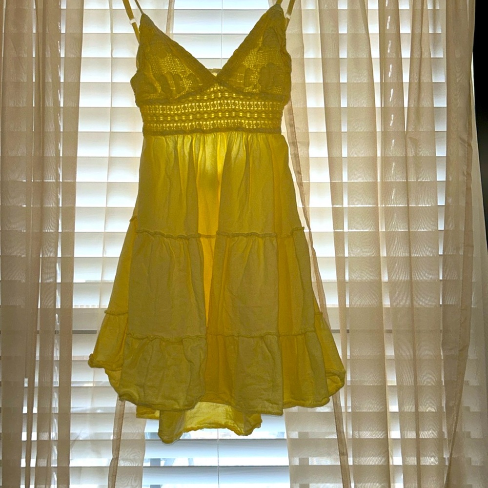 Mini yellow open back dress